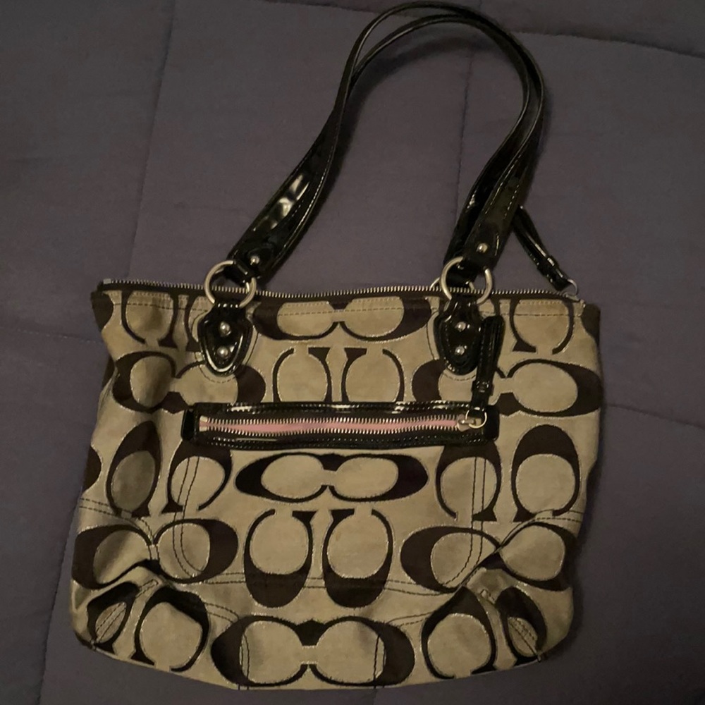 Black and gray Coach purse